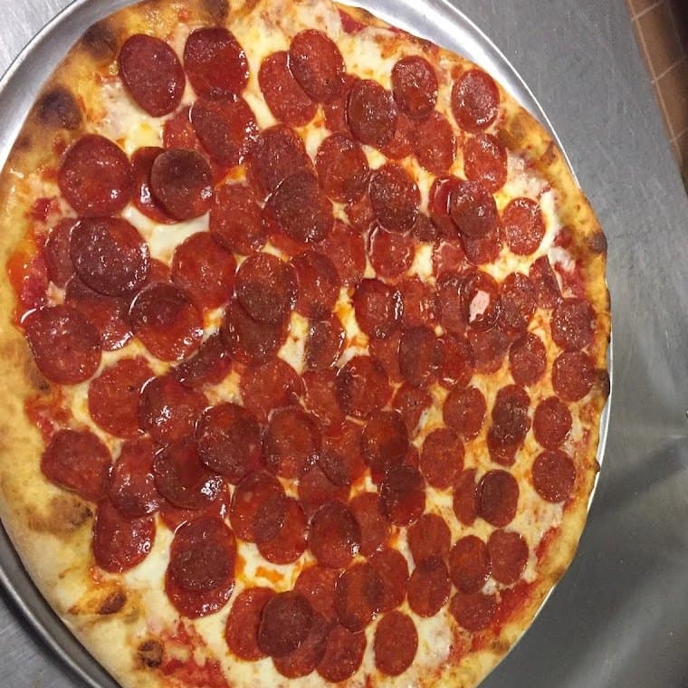 Whole New York style pepperoni pizza at Pizzeria DiMeo in Smyrna